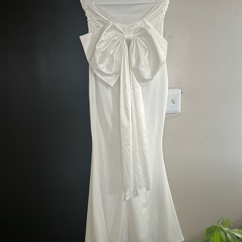 Elegant White Gown with Bow Detail